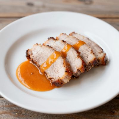 Arrosto di maiale con salsa piccante di arance