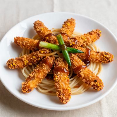 Sminuzzato di pollo in agrodolce con tagliatelle